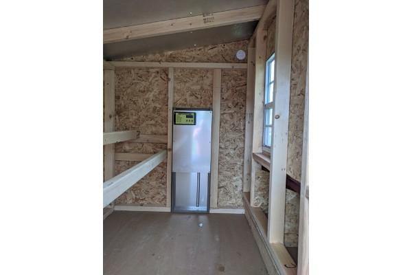 OverEZ Automatic Chicken Coop Door Inside of a Chicken Coop