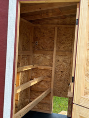 Roosting bars inside OverEZ Walk-In Chicken Coop